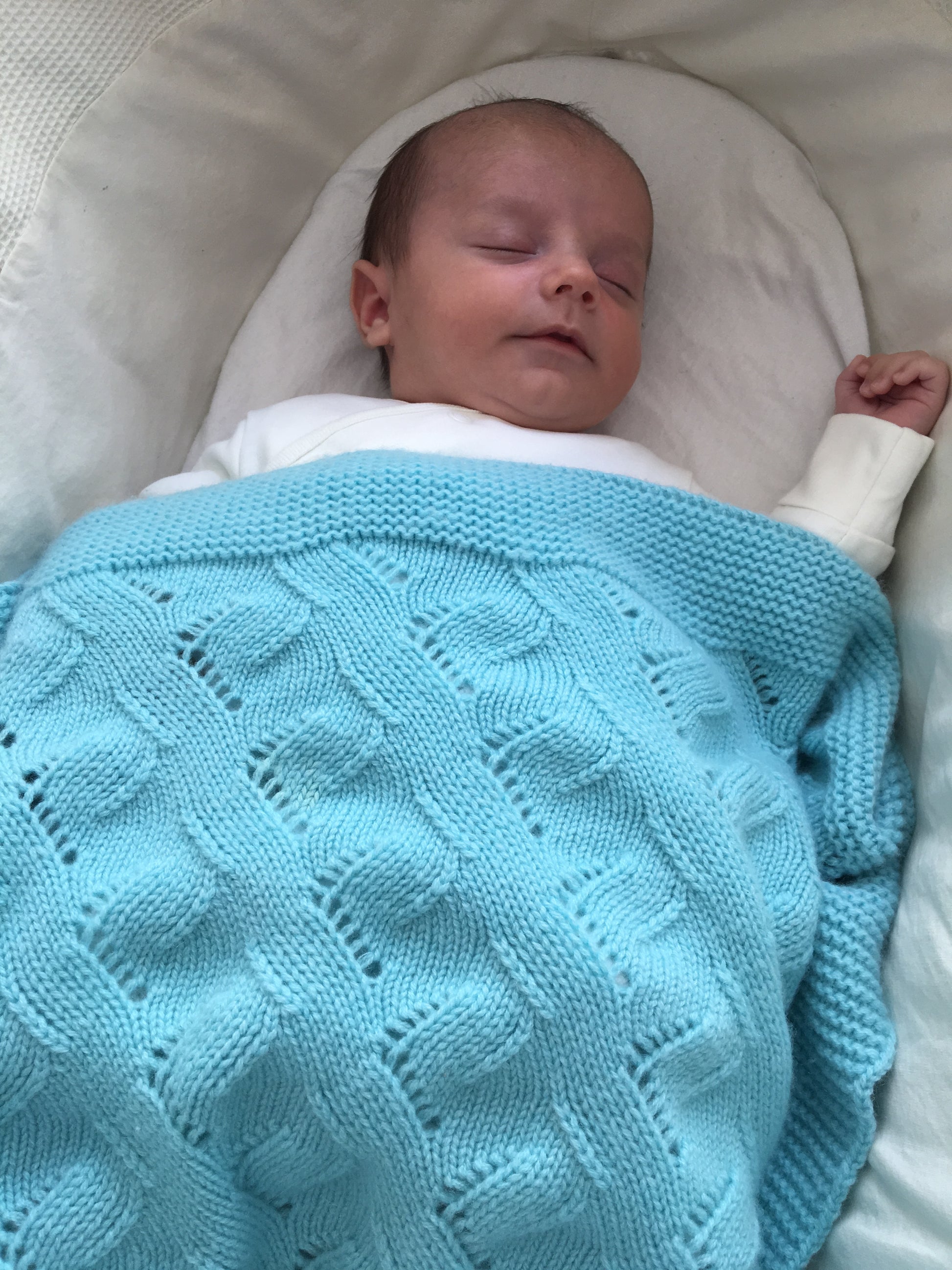 Luxury soft knitted lace cable cashmere baby blanket, made in Scotland by Love Cashmere