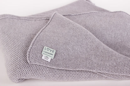 Waffle Stitch Cashmere Blanket close up in Light Grey